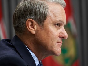Cameron Friesen speaks during the daily briefing at the Manitoba Legislative Building, in Winnipeg, Thursday Aug. 27, 2020.The Manitoba government is, for the second time in three months, shrinking the size of its projected deficit.THE CANADIAN PRESS/David Lipnowski