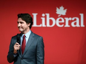 Prime Minister Justin Trudeau delivers an address at the Laurier Club Holiday Event, an event for supporters of the Liberal Party of Canada, in Gatineau, Que., on Thursday, Dec. 15, 2022.