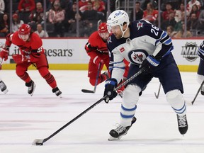 Blake Wheeler (26) of the Winnipeg Jets heads up ice during the first period while playing the Detroit Red Wings at Little Caesars Arena on Jan. 10, 2023 in Detroit.
