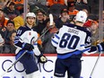 Kyle Connor (81) of the Winnipeg Jets looks on after scoring during the first period against the Philadelphia Flyers at Wells Fargo Center on Jan. 22, 2023 in Philadelphia.