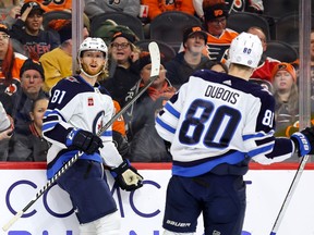 Kyle Connor (81) of the Winnipeg Jets looks on after scoring during the first period against the Philadelphia Flyers at Wells Fargo Center on Jan. 22, 2023 in Philadelphia.
