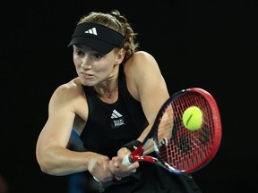 Elena Rybakina of Kazakhstan plays a backhand in the Semifinals singles match against Victoria Azarenka during day 11 of the 2023 Australian Open at Melbourne Park on January 26, 2023 in Melbourne, Australia.