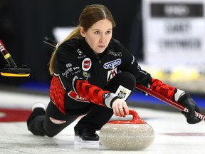 Skip Kaitlyn Lawes delivers a rock during the Scotties Tournament of Hearts championship at the East St. Paul Arena yesterday.