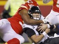 Derrick Nnadi of the Kansas City Chiefs sacks Trevor Lawrence of the Jacksonville Jaguars at Arrowhead Stadium on January 21, 2023 in Kansas City, Missouri.