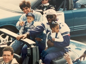 (Left to right) Mother Tammy, son Jackson, son Jaren (face hidden by father's arm), father Jim and daughter Jacqueline at one of two Super Bowl parades in Dallas (1993 or '94).