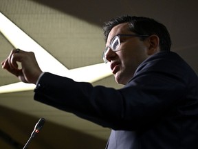 Conservative leader Pierre Poilievre speaks during a media availability on Parliament Hill in Ottawa, Friday, Dec. 30, 2022.