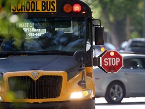 A school bus in front of a school in Winnipeg on Wednesday, Sept. 7, 2022.