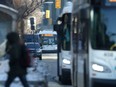 Transit buses on the road in Winnipeg on Wednesday, Jan. 4, 2023.