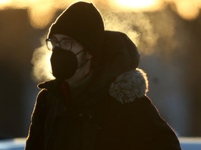 A person walking in extreme cold in Winnipeg on Saturday Jan. 28, 2023.