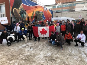 Winnipeg Running Club members gather at the Main Street Project on Saturday, Jan. 14, 2023, following the completion of their Nation Run and Main Street Project donation drive.