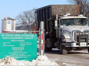 A garbage truck leaves the Prairie Green landfill on Highway 7 north of Winnipeg. Winnipeg Sun file