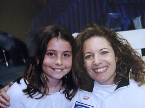 Eight-year-old Shannon Birchard and Colleen Jones at the World Curling Championship in Winnipeg in 2003.