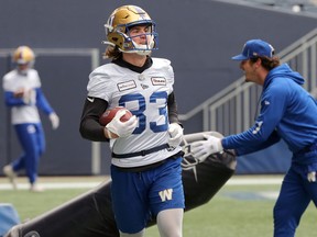 Winnipeg Blue Bombers receiver Dalton Schoen smiles during a practice last season.