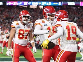 Kadarius Toney of the Kansas City Chiefs (No. 19) celebrates with quarterback Patrick Mahomes after a five-yard touchdown reception against the Philadelphia Eagles during the fourth quarter in Super Bowl LVII at State Farm Stadium on Feb. 12, 2023 in Glendale, Ariz.