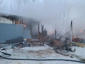 A 28-year-old woman has been charged with arson following a house fire in Okno, Man. on Jan. 20, 2023.