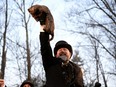 AJ Dereume holds up Phil the groundhog as he is to make his prediction on how long winter will last during the Groundhog Day Festivities, at Gobblers Knob in Punxsutawney, Pennsylvania, U.S., February 2, 2023. REUTERS/Alan Freed     TPX IMAGES OF THE DAY