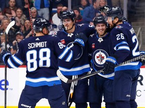 Winnipeg Jets right wing Blake Wheeler (26) celebrates his second period goal against the Seattle Kraken at Canada Life Centre in Winnipeg on Tuesday, Feb. 14, 2023.