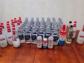 Photo shows alcohol that was confiscated by RCMP near the community of Ponton during an incident that led to one woman being charged under the Liquor, Gaming and Cannabis Control Act.