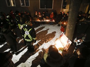 Family and friends of three murdered women gather at a vigil in Winnipeg, Thursday, December 1, 2022. It was announced that Jeremy Skibicki faces three more charges of first-degree murder. In addition to Rebecca Contois, who was identified earlier, Skibicki has been charged in the deaths of Morgan Beatrice Harris, Marcedes Myran, and an unidentified woman whom Indigenous leaders have dubbed Buffalo Woman.