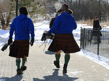 Members of Queen's Own Cameron Highlanders of Canada arrive at Assiniboine Park in Winnipeg for the Great Canadian Kilt Skate on Sunday, Feb. 26, 2023.