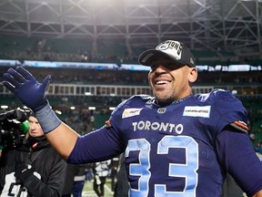 Andrew Harris (33) of the Toronto Argonauts celebrates after winning the 109th Grey Cup game between the Toronto Argonauts and Winnipeg Blue Bombers at Mosaic Stadium on Nov. 20, 2022 in Regina.