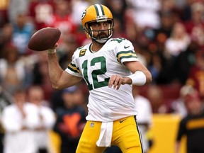 Aaron Rodgers of the Green Bay Packers attempts a pass during the third quarter of the game against the Washington Commanders at FedExField on October 23, 2022 in Landover, Maryland.