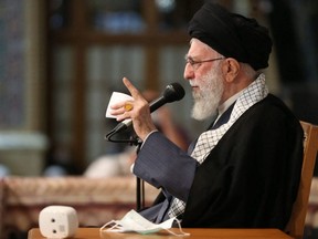 This handout picture provided by the office of Iran's Supreme Leader Ayatollah Ali Khamenei shows him speaking before people during a rally in the city of Mashhad, March 21, 2023.