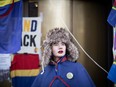 A Norwegian Sami protester poses in traditional clothes. Climate activist Greta Thunberg and dozens of indigenous Sami activists expanded a protest on against contested wind turbines in Norway by blocking entrances to several government ministries. (Photo by Olivier MORIN / AFP)