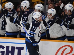 Nikolaj Ehlers celebrates his third-period goal that ended a drought of 111 minutes and 39 seconds for the Jets.