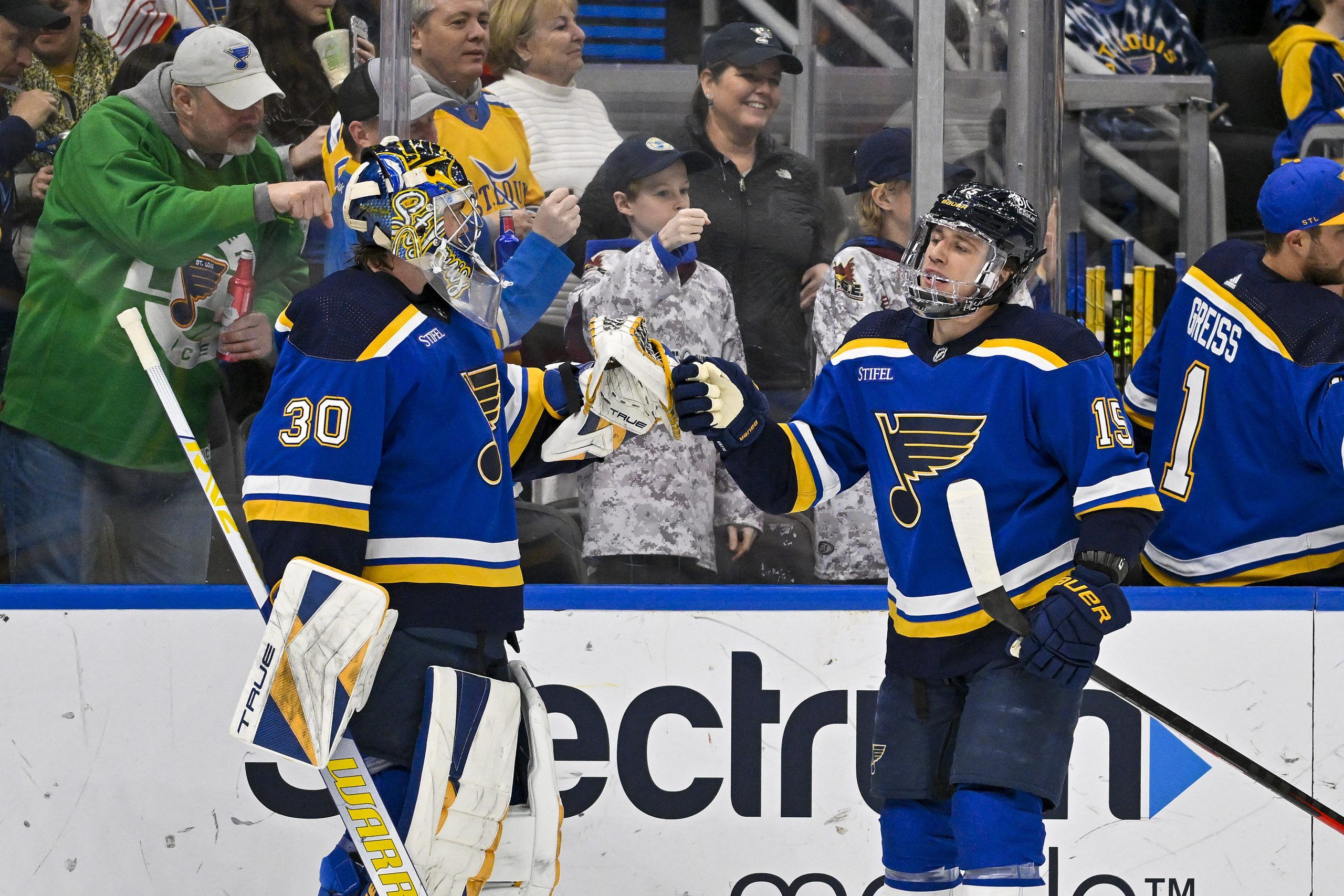 Winnipegger Joel Hofer (left) earned his third NHL victory and first shutout, while Jakub Vrana scored a goal on a third-period breakaway.