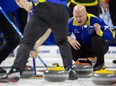 Skip Kevin Koe calls out instructions during Team Alberta's 7-4 win over Northern Ontario on Sunday March 5, 2023 at the Tim Hortons Brier at Budweiser Gardens in London. (Mike Hensen/The London Free Press)