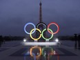 The Olympic Rings is seen on the Trocadero Esplanade near the Eiffel Tower in Paris, Sept. 13, 2017.