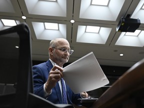Minister of Justice David Lametti prepares to appear before the Standing Committee on Justice and Human Rights in Ottawa, Monday, March 6, 2023.
