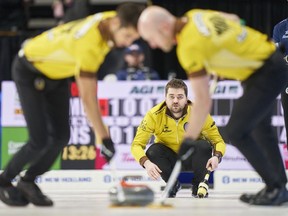 Manitoba skip Matt Dunstone watches his shot during his match against Nova Scotia at the 2023 Tim Hortons Brier at Budweiser Gardens in London, Ont., Tuesday, March 7, 2023.