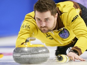 Manitoba skip Matt Dunstone delivers a shot during Manitoba's match against Alberta at the 2023 Tim Hortons Brier at Budweiser Gardens in London, Ontario on Wednesday, March 8, 2023.