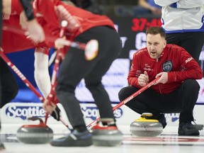 Team Canada skip Brad Gushue yells instructions to the sweepers during Canada's first draw against British Columbia at the 2023 Tim Hortons Brier at Budweiser Gardens in London, Ont. on Friday, March 3, 2023.