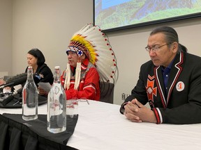 Assembly of Manitoba Chiefs Grand Chief Cathy Merrick, St. Theresa Point First Nation Chief Elvin Flett, Gregory Wood, band councillor with St. Theresa Point First Nation take part in a press conference in Winnipeg, Friday, March 24, 2023. Flett believes drug use played a role in the deaths of two 14-year-old girls earlier this month.