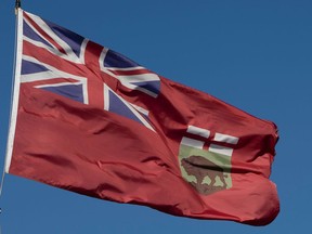The flag of Manitoba flies on Monday, Nov. 1, 2021 in Ottawa. The family registration number on Manitoba health cards are to include a letter.
