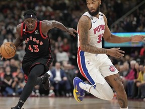Toronto Raptors forward Pascal Siakam (43) moves the ball up court against Detroit Pistons forward Marvin Bagley III (35) during first half NBA basketball action in Toronto on Friday, March 24, 2023.