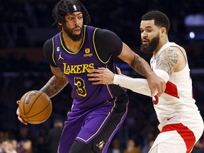 Anthony Davis of the Los Angeles Lakers controls the ball against Fred VanVleet of the Toronto Raptors in the second half at Crypto.com Arena on March 10, 2023 in Los Angeles, Calif.
