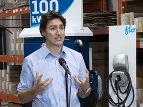 Prime Minister Justin Trudeau speaks to the media after a visit to FLO, a maker of electric car chargers, in Shawinigan, Que., Jan. 18, 2023.
