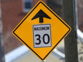 A traffic sign indicating a reduced speed zone ahead, in Winnipeg on Friday, March 3, 2023.