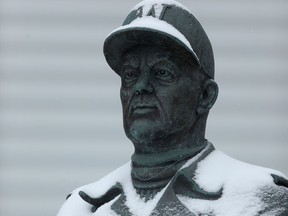 The statue of Bud Grant in Winnipeg at IG Field in Winnipeg on Saturday, March 11, 2023. Grant, one of the most revered people ever associated with the Winnipeg Blue Bombers and the CFL, passed away Saturday at the age of 95.