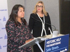 Manitoba Keewatinowi Okimakanak MMIWG liason unit director Heidi Spence addresses the media with Manitoba Families Minister Rochelle Squires at a press conference at RCMP headquarters in Winnipeg on Monday, March 20, 2023, to announce the Manitoba government is investing $2.1 million to fund dedicated police resources to establish a Manitoba Integrated Missing Persons Response. The investment will reduce the number of missing adults and children across the province and provide co-ordinated inter-agency supports to those that go missing chronically.