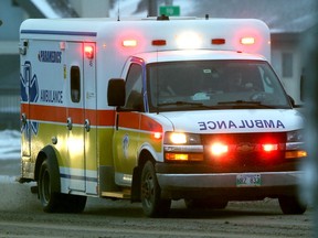 An ambulance in traffic in Winnipeg. Chris Procaylo, Wednesday March 22. 2023 Winnipeg Sun