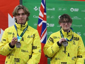 Ryder Wilson (16, Selkirk) and Emily Love (17, Winnipeg) show off their silver medals, earning their second medals each, and first in archery's recurve mix team event at the 2023 Canada Winter Games at the Eastlink Centre in P.E.I., n Saturday, March 4, 2023. Team Manitoba/Sport Manitoba