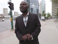 Razak Iyal, one of two asylum seekers who walked across the Canada/US border in December and lost his fingers and toes because of severe frostbite, is photographed as he enters his refugee hearing in Winnipeg, Tuesday, June 13, 2017.