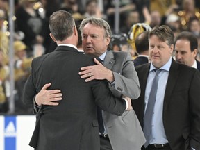 Jets head coach Rick Bowness, shown hugging Vegas assistant John Stevens, didn't pull any punches in talking about his team's performance in Game 5.