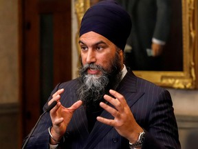 NDP Leader Jagmeet Singh uses his hands to demonstrate his plan to take Galen Weston's raise. Okay just kidding, it's a photo of Singh from last week reacting to the federal budget.