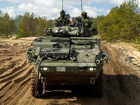 Canadian servicemen of NATO-enhanced Forward Presence battle group attend the Crystal Arrow military exercise in Adazi, Latvia, March 29, 2023.